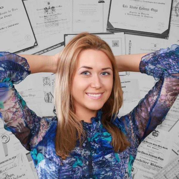 woman standing in front of a pile of diplomas from high schools and colleges